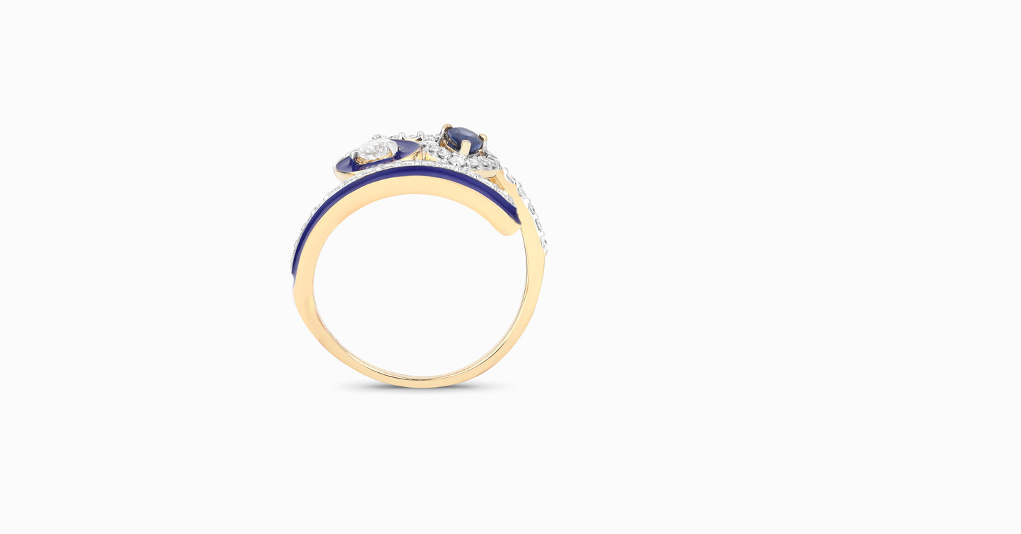 14kt yellow gold ring with round and pear-shaped diamonds and pear-shaped blue sapphire