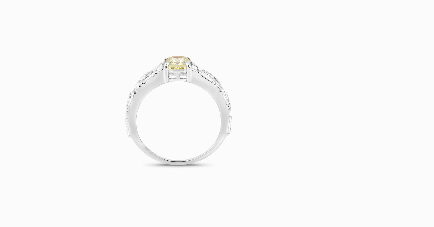 14kt white gold ring with round and baguette-shaped diamonds and cushion-cut natural yellow diamond