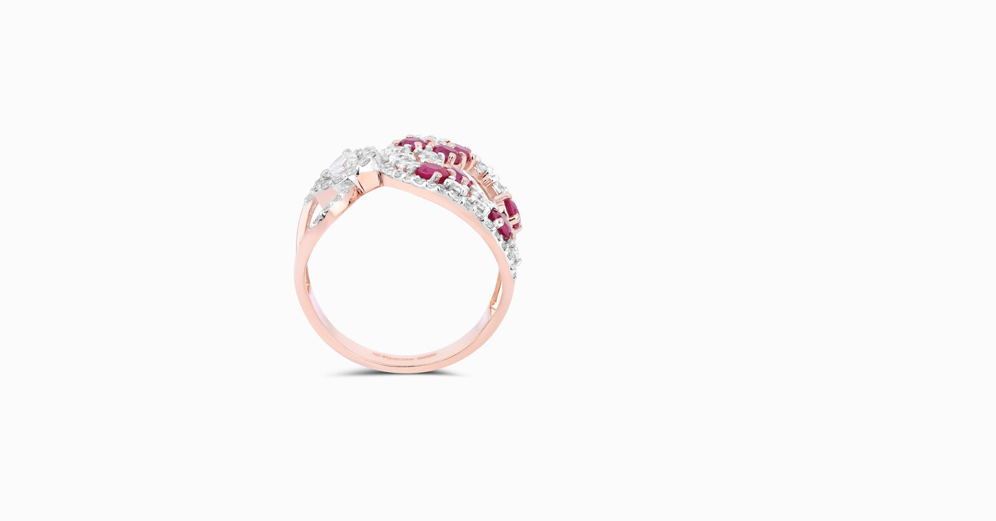 14kt white gold ring with round and pear-shaped diamonds and round-shaped ruby