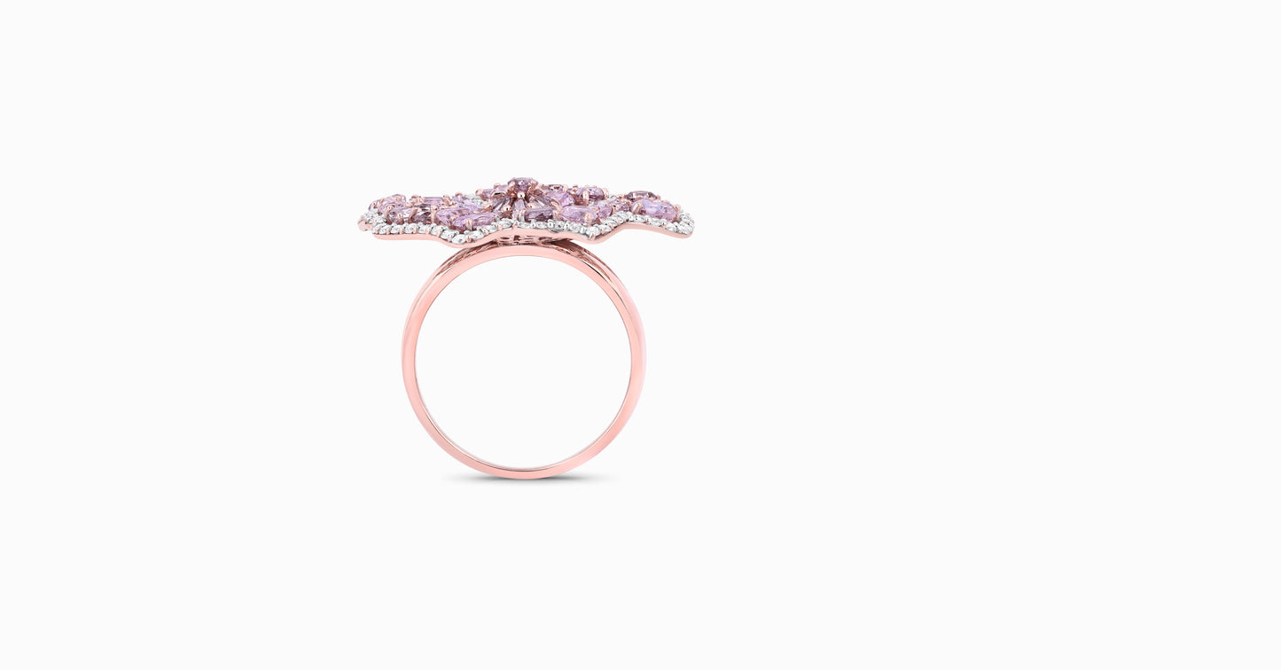 18kt rose gold ring with round-shaped white diamonds and mixed fancy-shaped natural pink diamonds