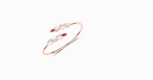 14kt rose gold bangle with marquise-shaped ruby and pave diamonds