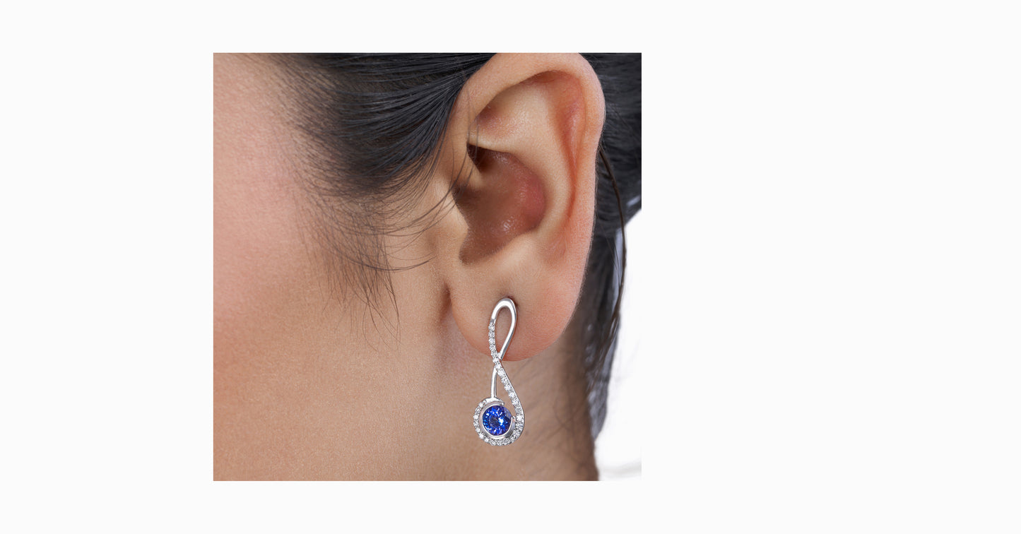 14kt white gold earrings with round-shaped tanzanite and pave diamonds