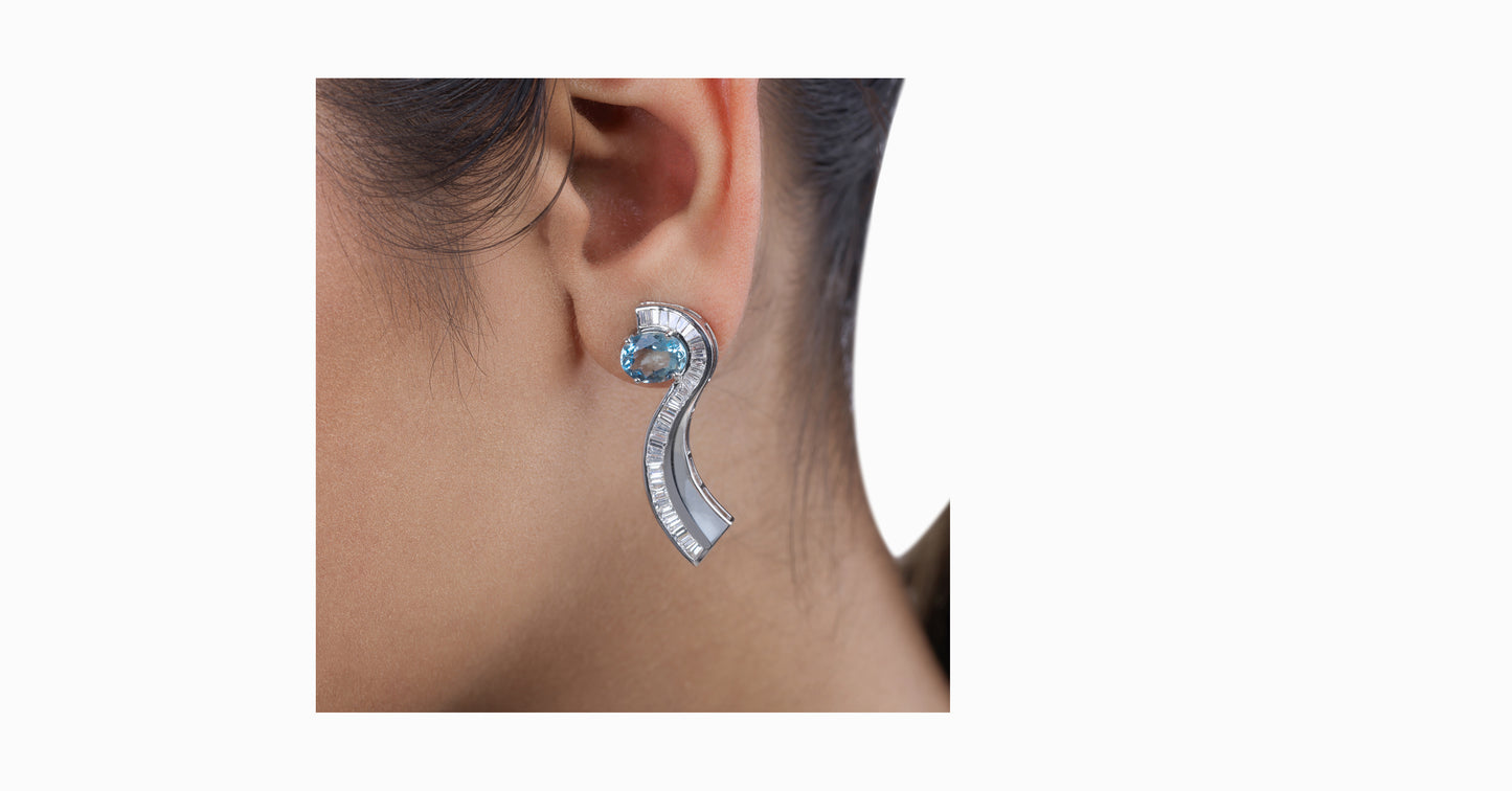 14kt white gold earrings with oval-shaped aquamarine and channel diamonds