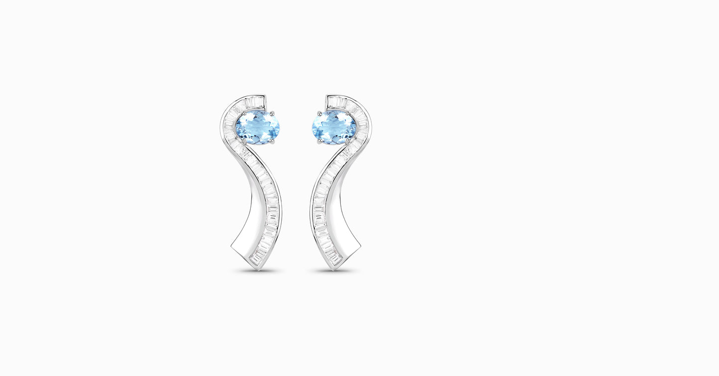 14kt white gold earrings with oval-shaped aquamarine and channel diamonds