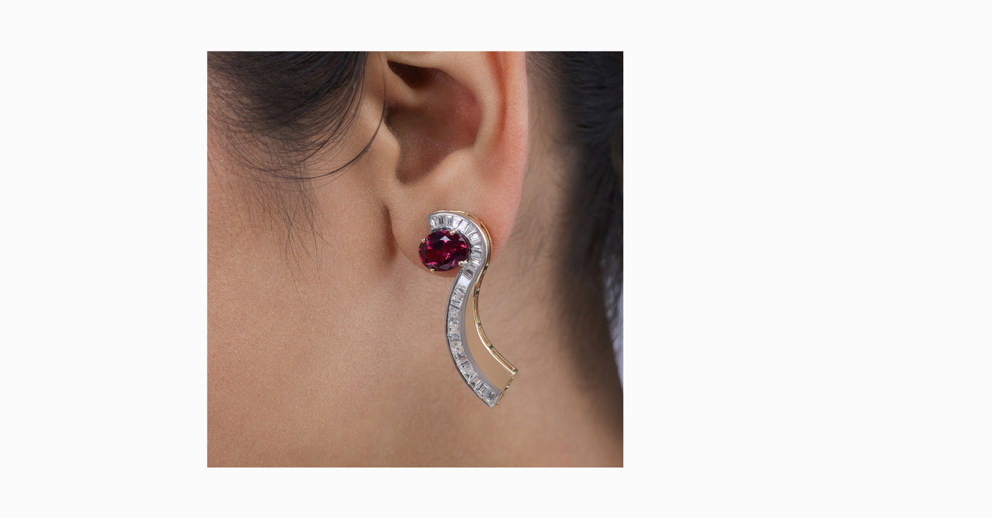 14kt yellow gold earrings with oval-shaped rhodolite and channel diamonds