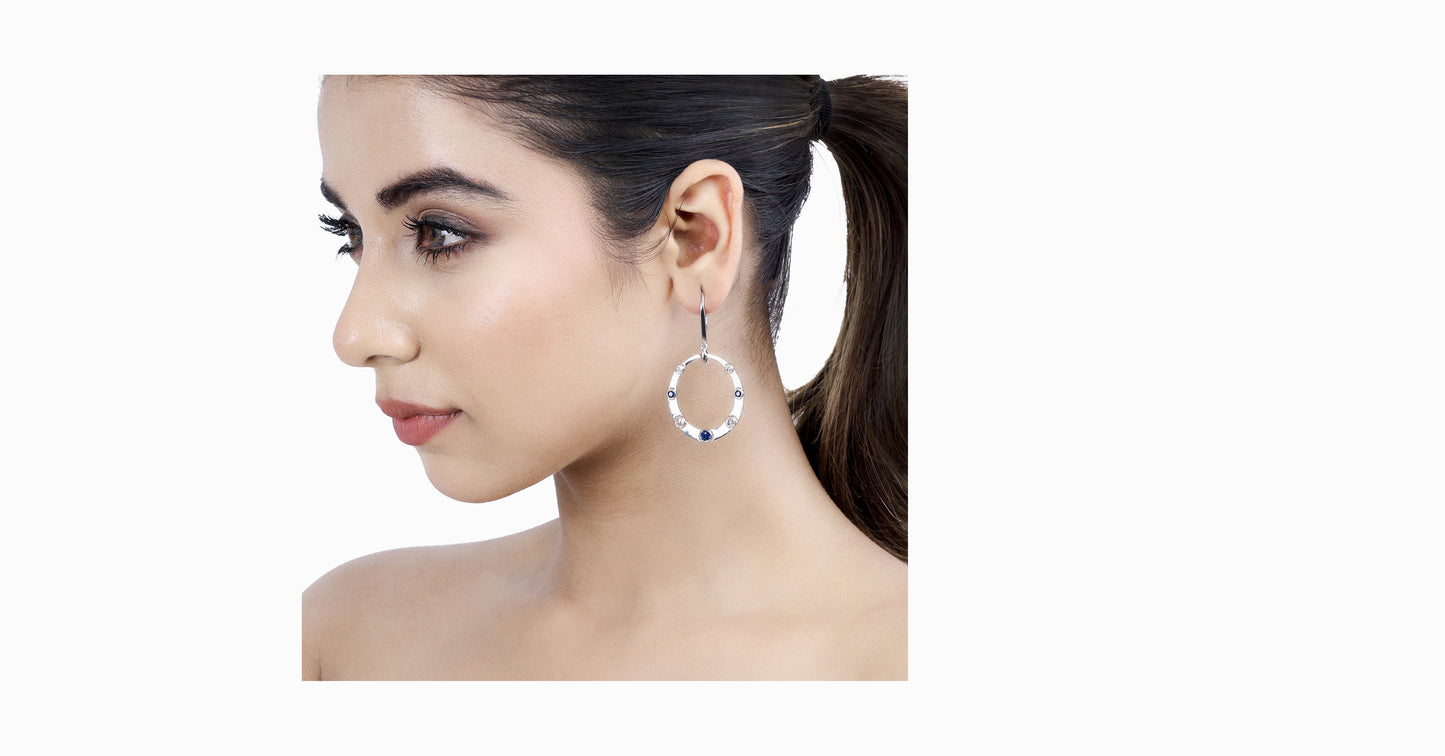 14kt white gold drop earrings with round-shaped sapphire and bezel diamonds