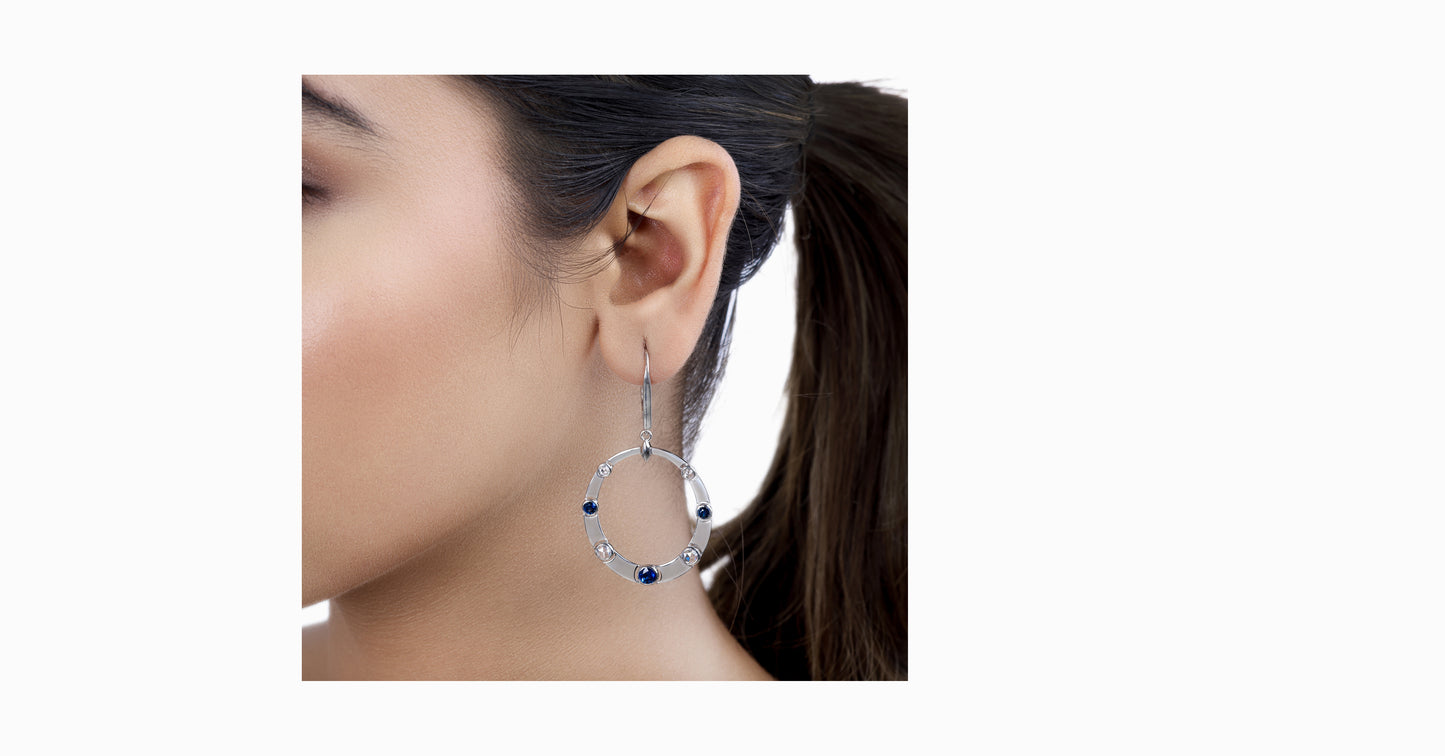 14kt white gold drop earrings with round-shaped sapphire and bezel diamonds
