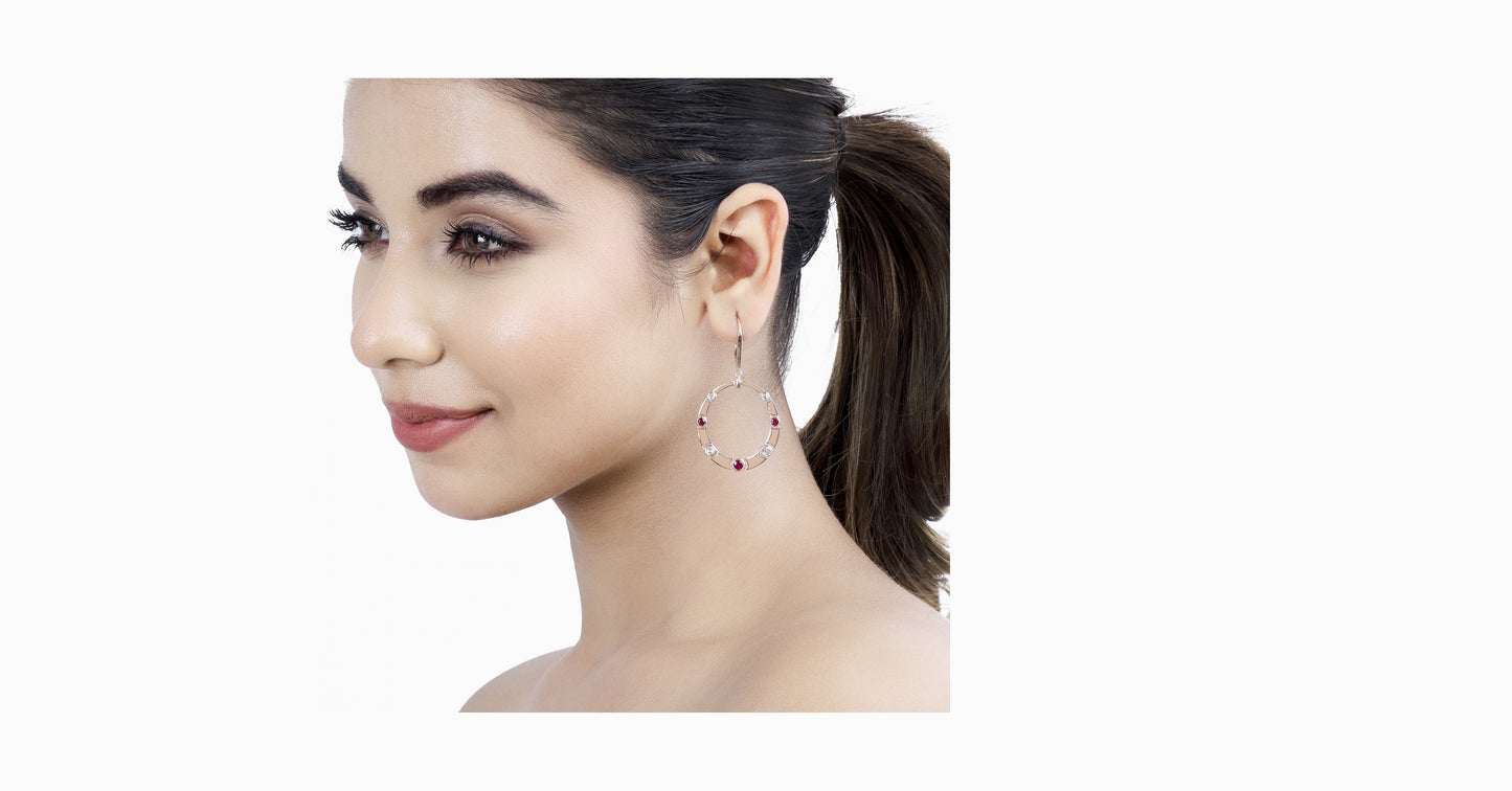 14kt rose gold drop earrings with round-shaped ruby and bezel diamonds