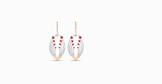 14kt rose gold earrings with round-shaped ruby and pave diamonds