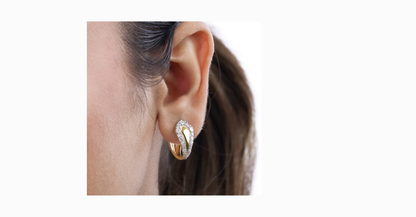 14kt yellow gold earrings with marquise-shaped emerald and pave diamonds