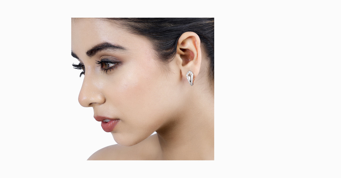 14kt rose gold earrings with marquise-shaped ruby and pave diamonds