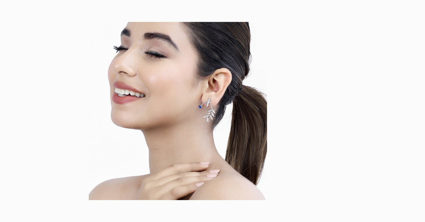 14kt white gold earrings with round-shaped sapphire and pave diamonds