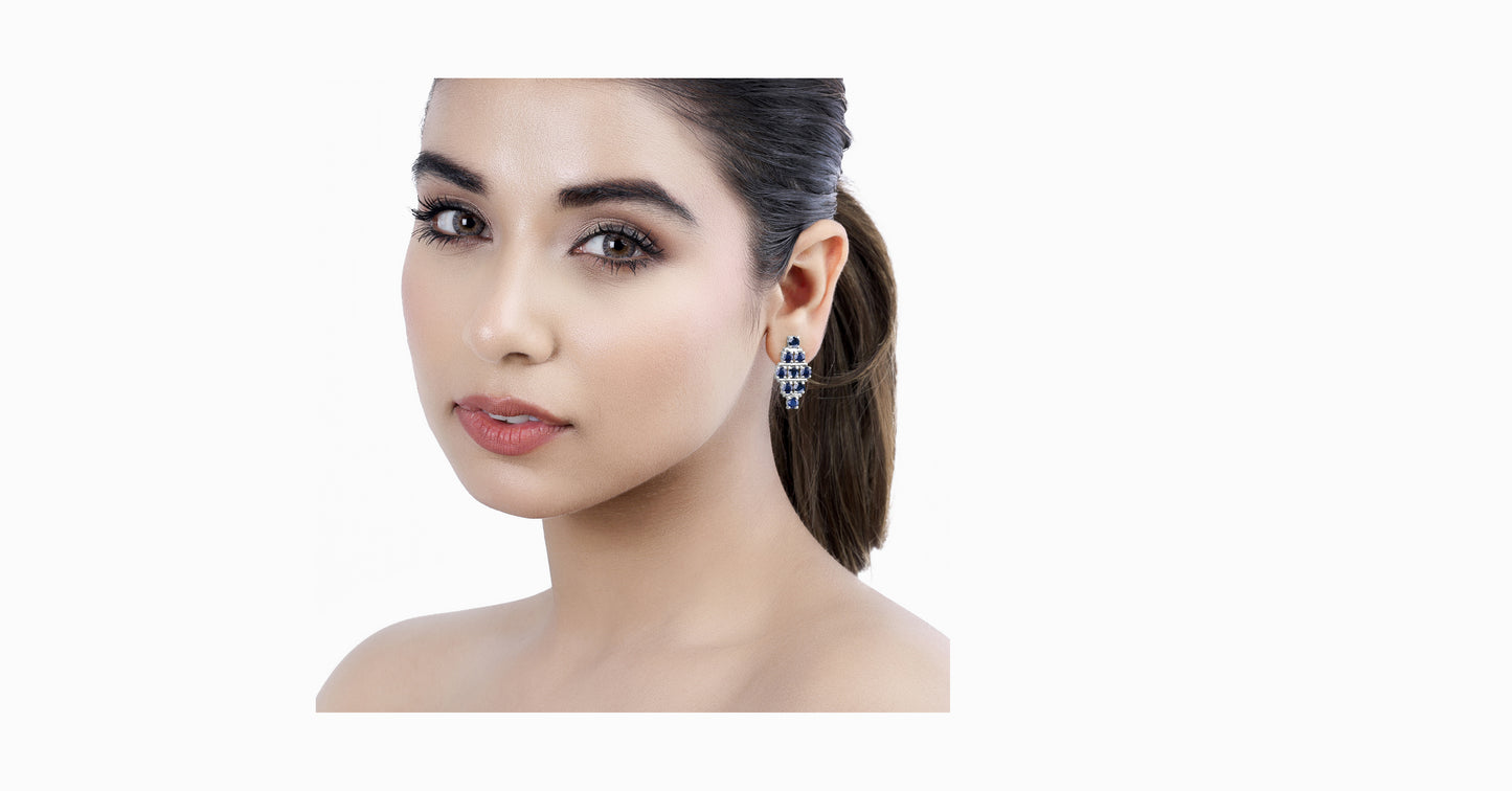 14kt white gold earrings with round-shaped sapphire