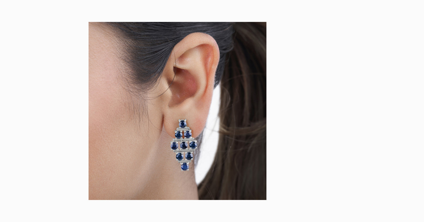 14kt white gold earrings with round-shaped sapphire