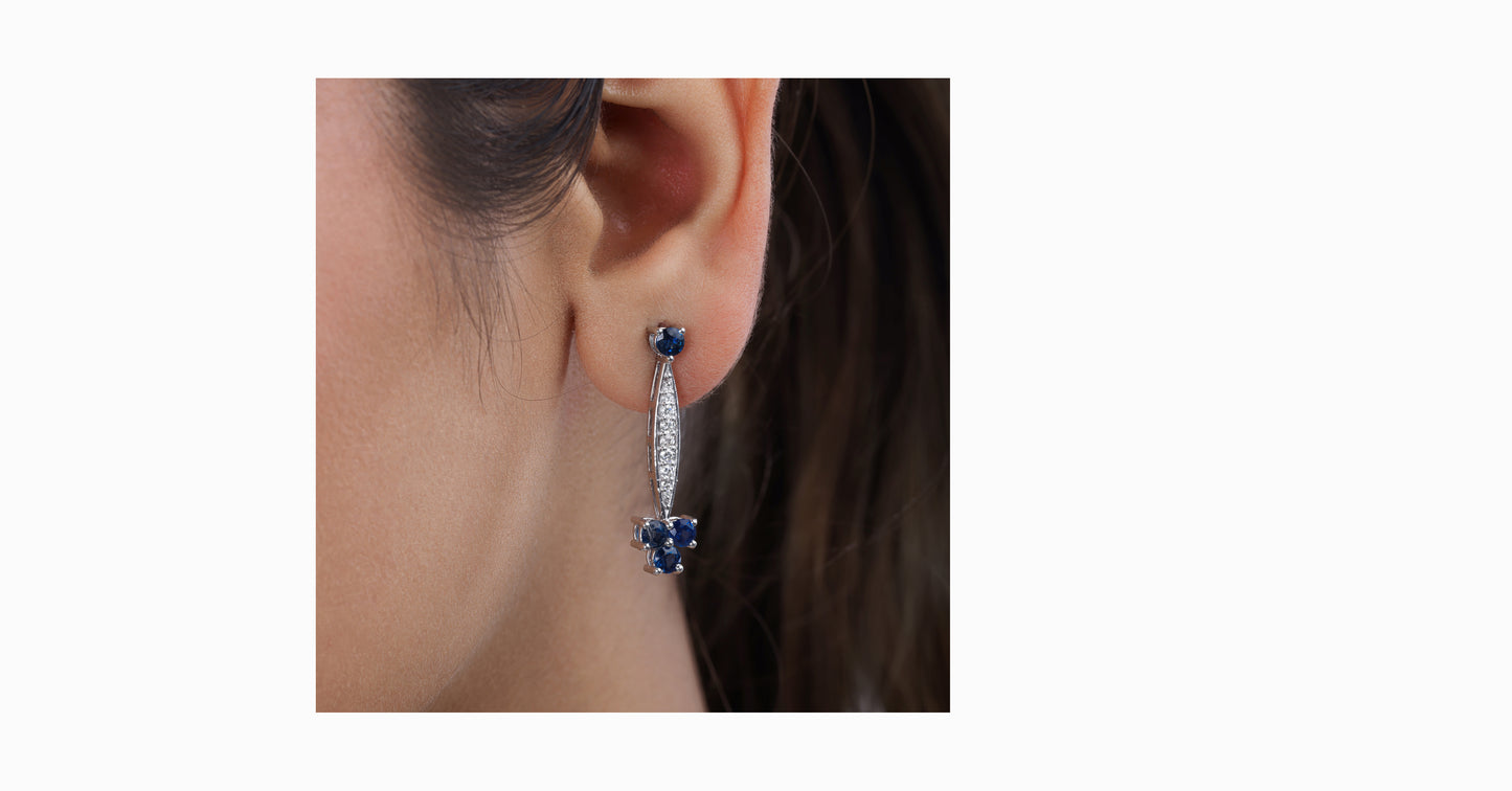 14kt white gold earrings with round-shaped sapphire and pave diamonds