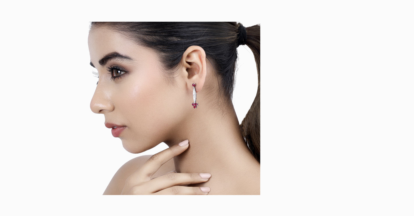 14kt white gold earrings with round-shaped ruby and pave diamonds