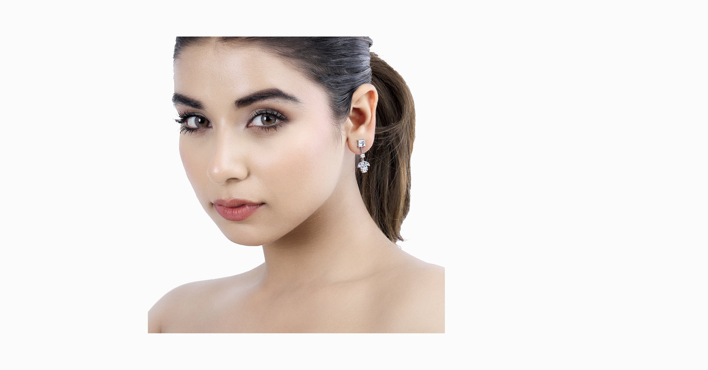 14kt white gold earrings with square-shaped, marquise-shaped aquamarine and diamonds