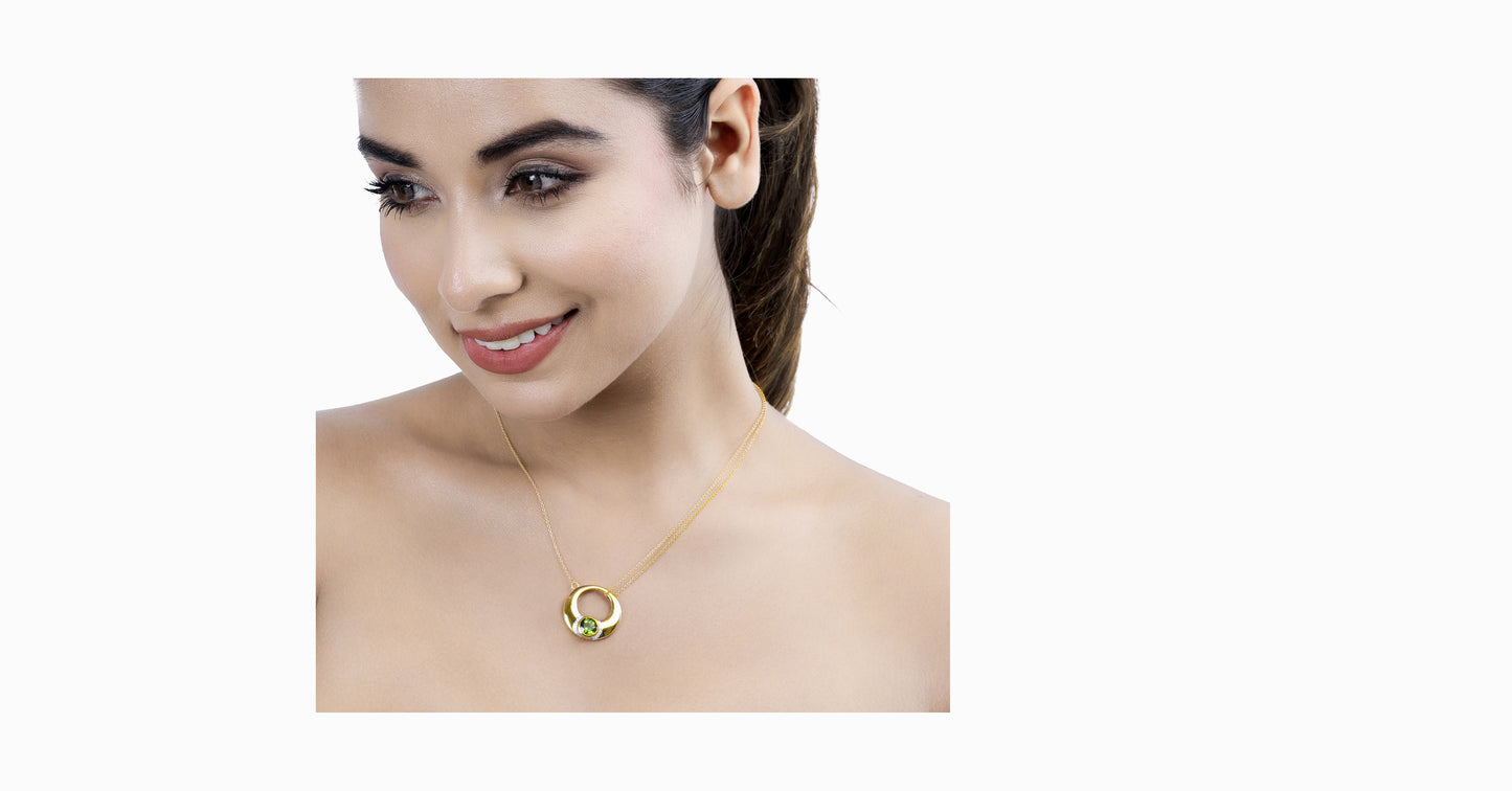 14kt yellow gold pendant with round-shaped green tourmaline and pave diamonds