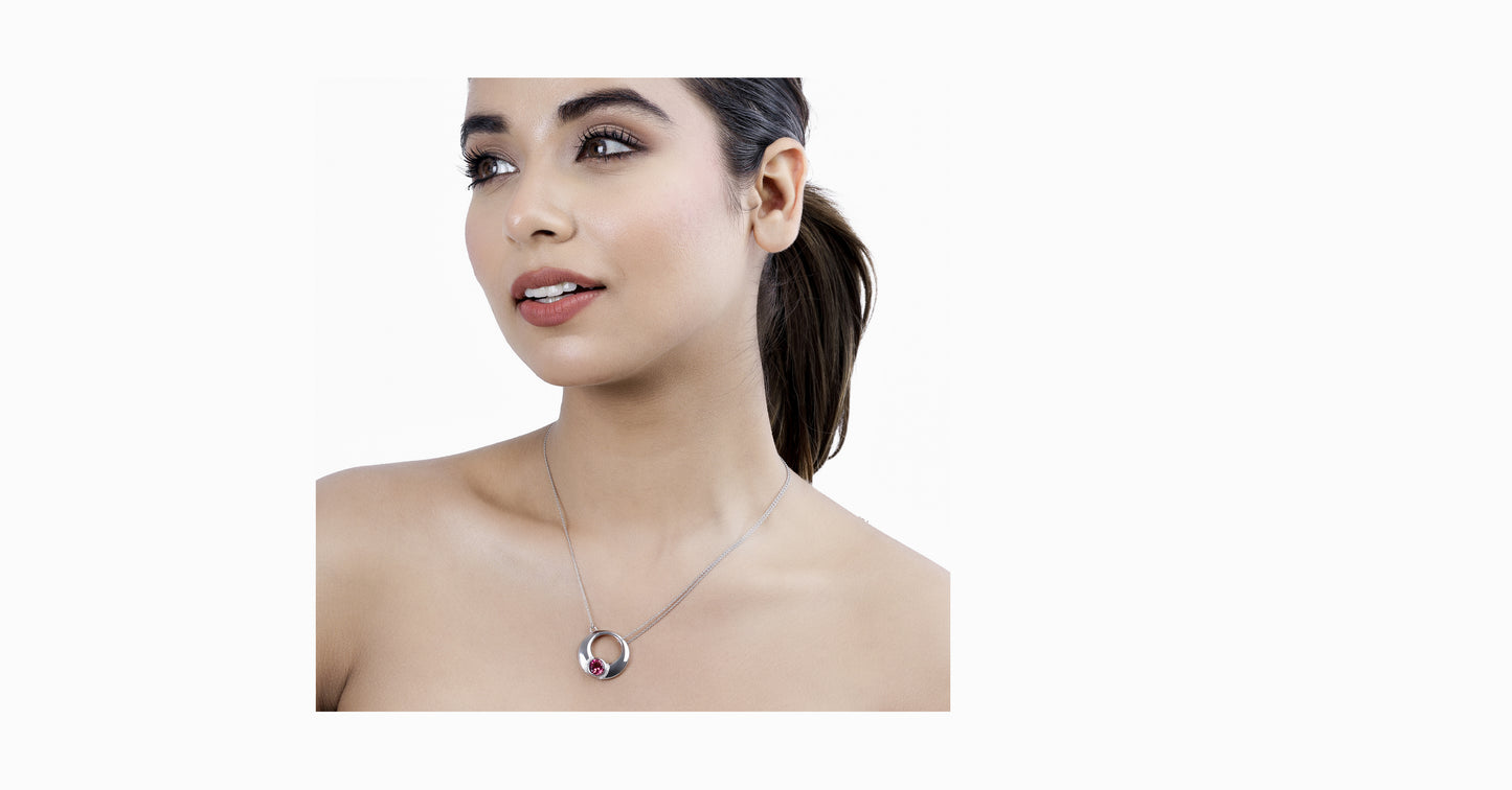 14kt white gold pendant with round-shaped pink tourmaline and pave diamonds