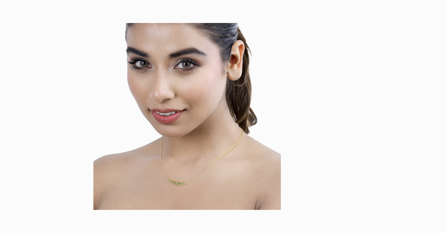 14kt yellow gold necklace with round-shaped emerald