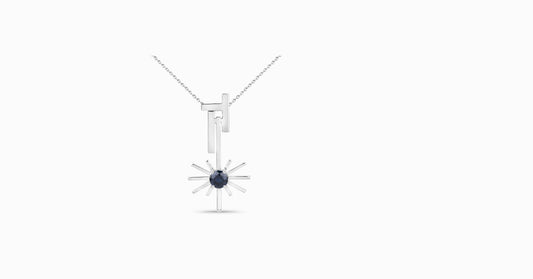 14kt white gold pendant with round-shaped blue sapphire