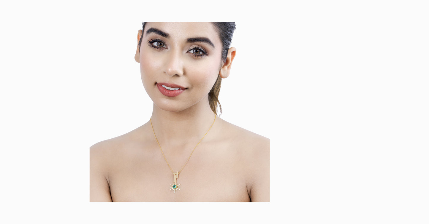 14kt yellow gold pendant with round-shaped emerald