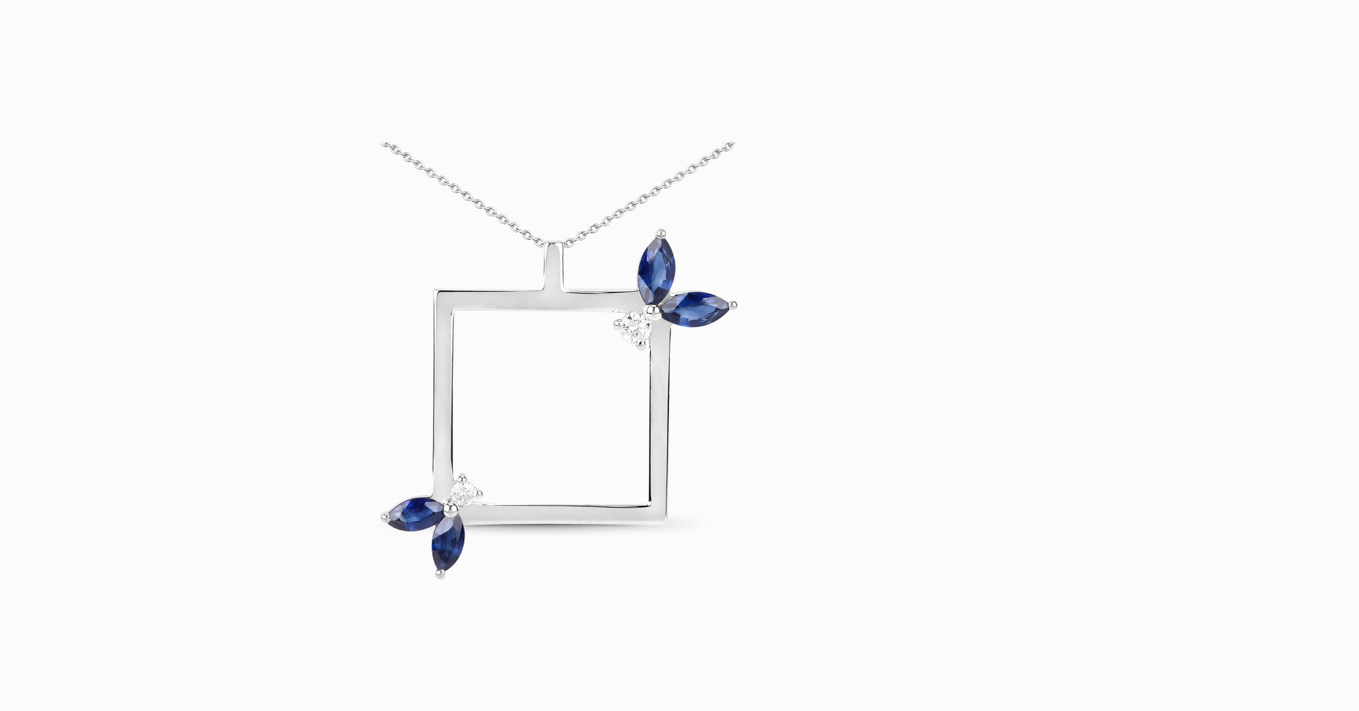 14kt white gold pendant with marquise-shaped blue sapphire and diamonds