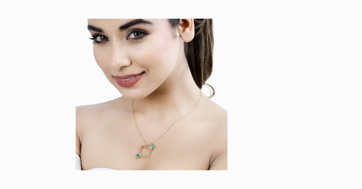 14kt yellow gold pendant with marquise-shaped emerald and diamonds