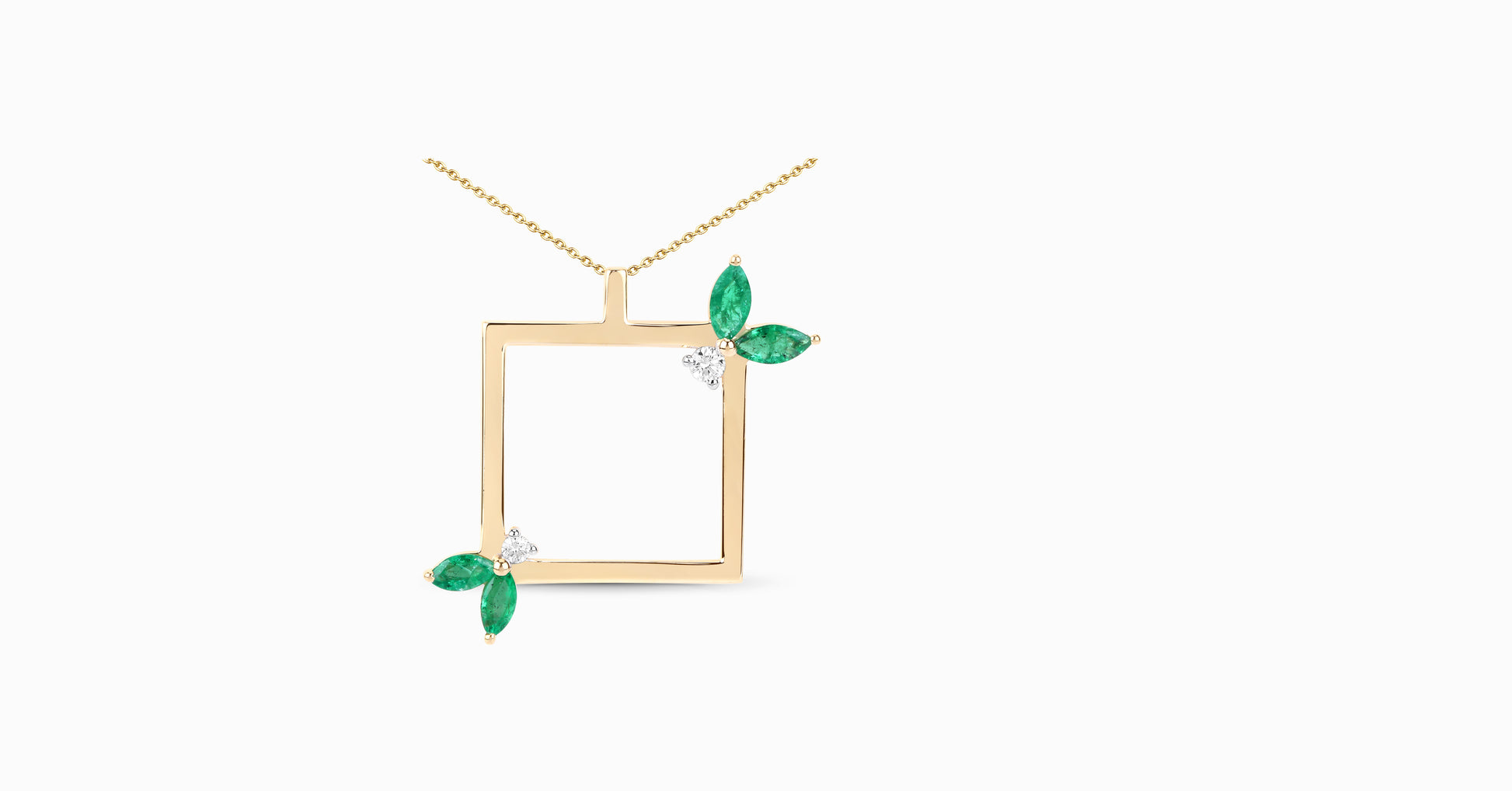 14kt yellow gold pendant with marquise-shaped emerald and diamonds