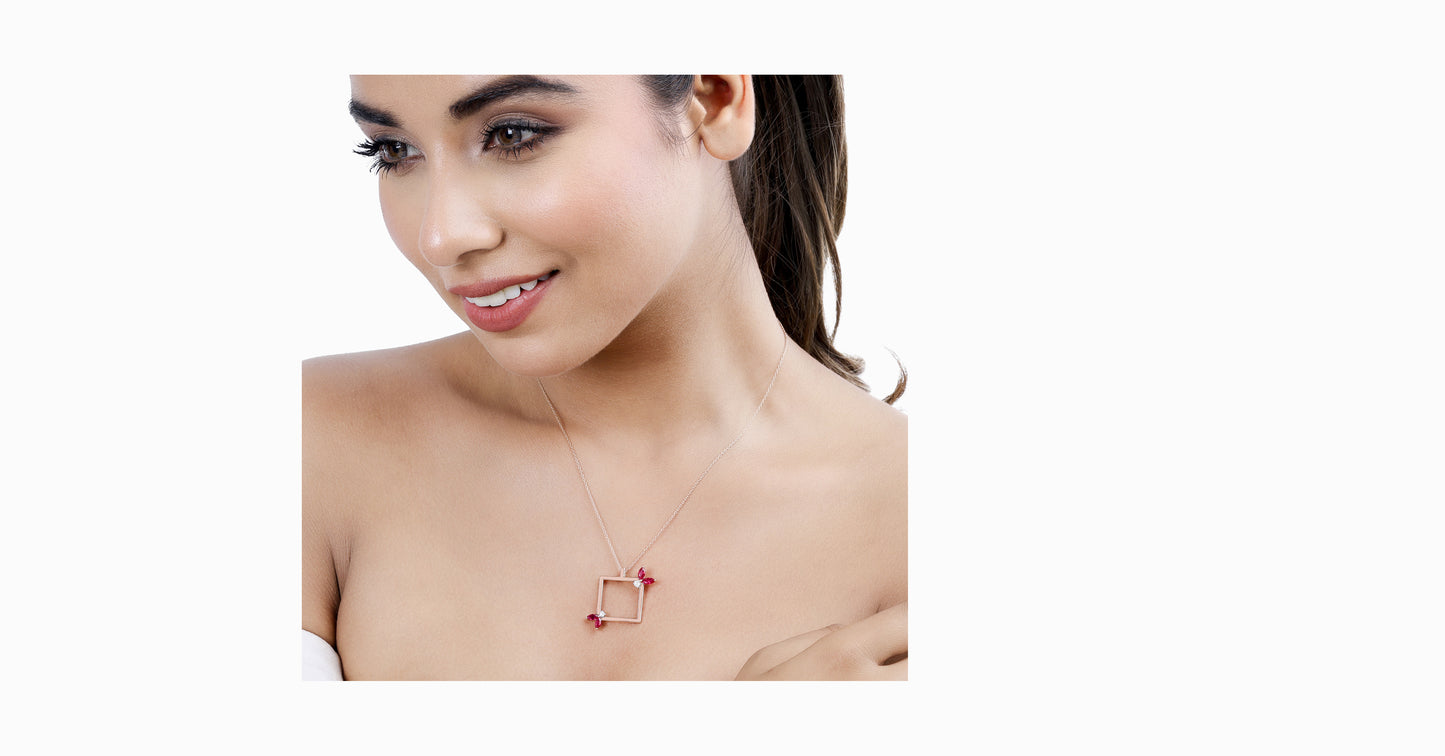 14kt rose gold pendant with marquise-shaped ruby and diamonds