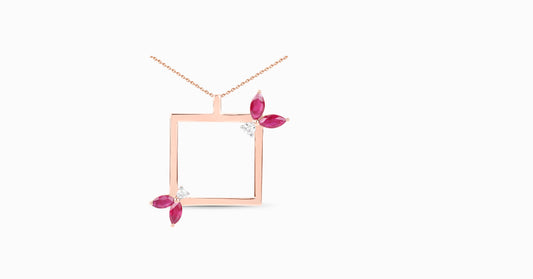 14kt rose gold pendant with marquise-shaped ruby and diamonds