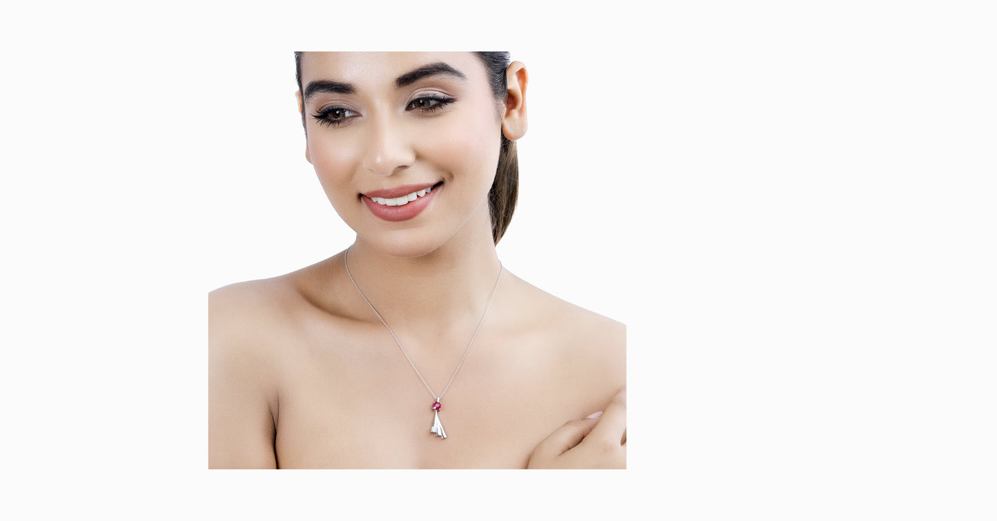 14kt white gold pendant with round-shaped ruby and diamond