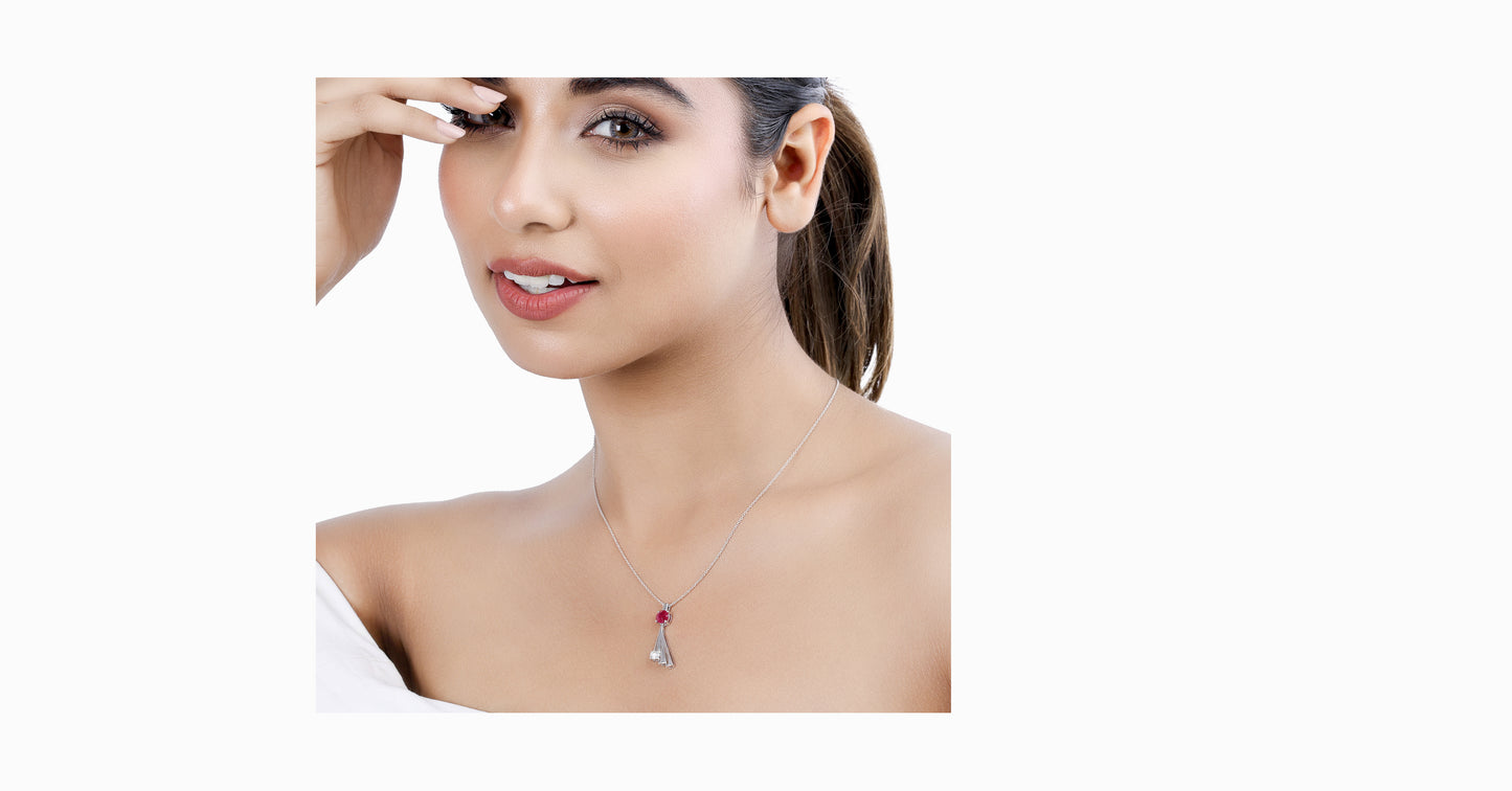 14kt white gold pendant with round-shaped ruby and diamond