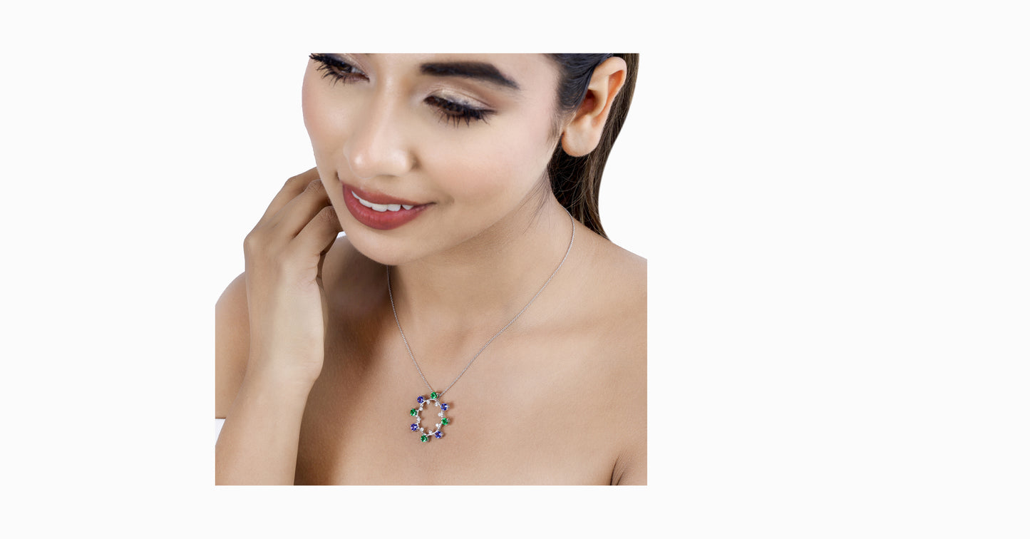 14kt white gold pendant with round-shaped Tanzanite, Tsavorite and diamonds