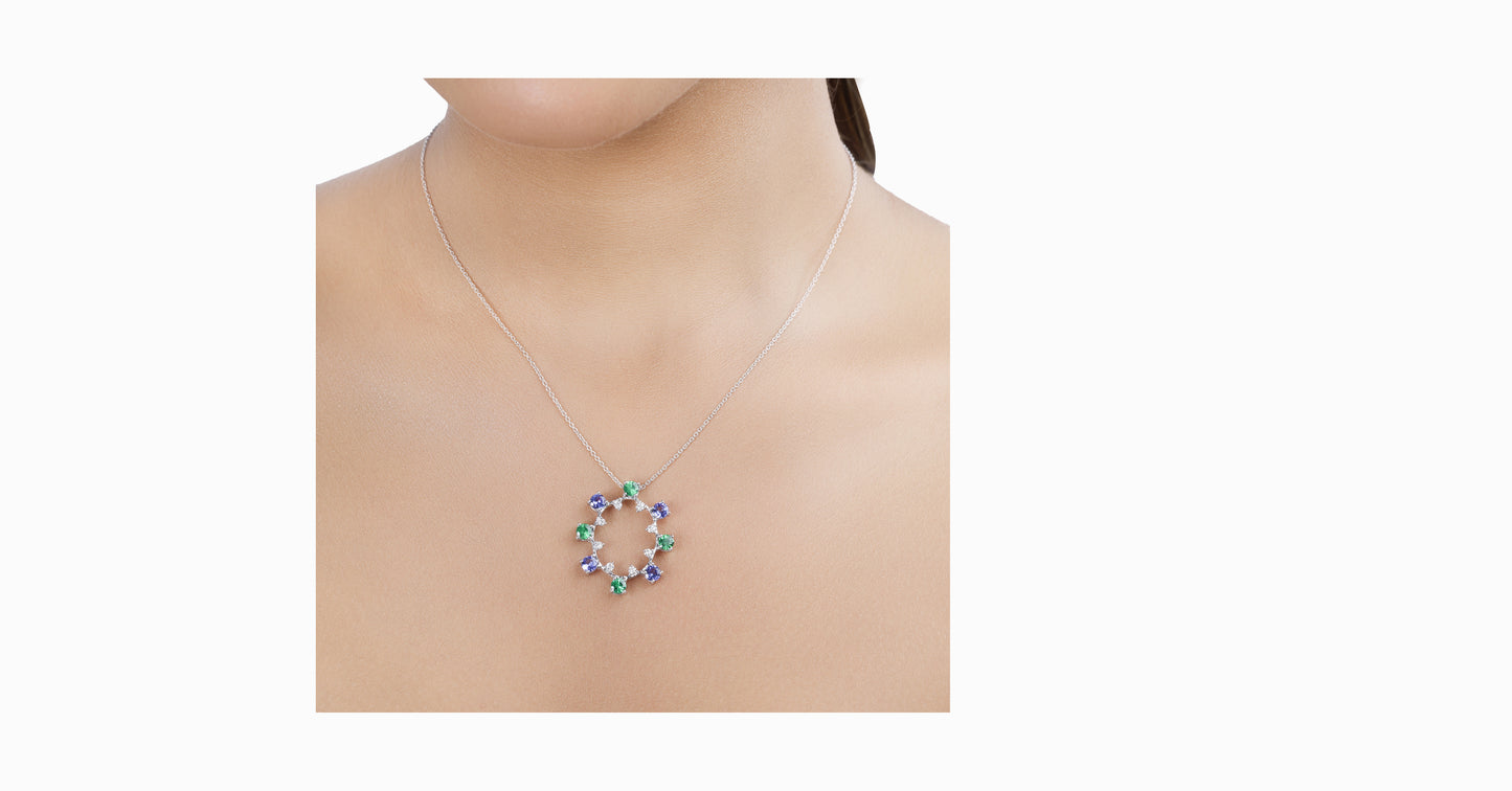 14kt white gold pendant with round-shaped Tanzanite, Tsavorite and diamonds