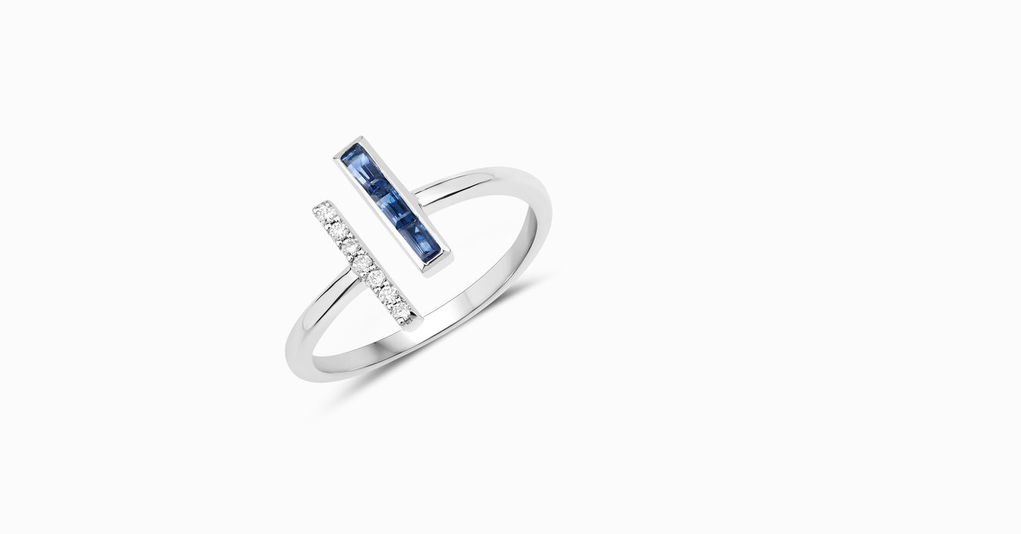 14kt white gold ring with baguette-shaped sapphire and pave diamonds