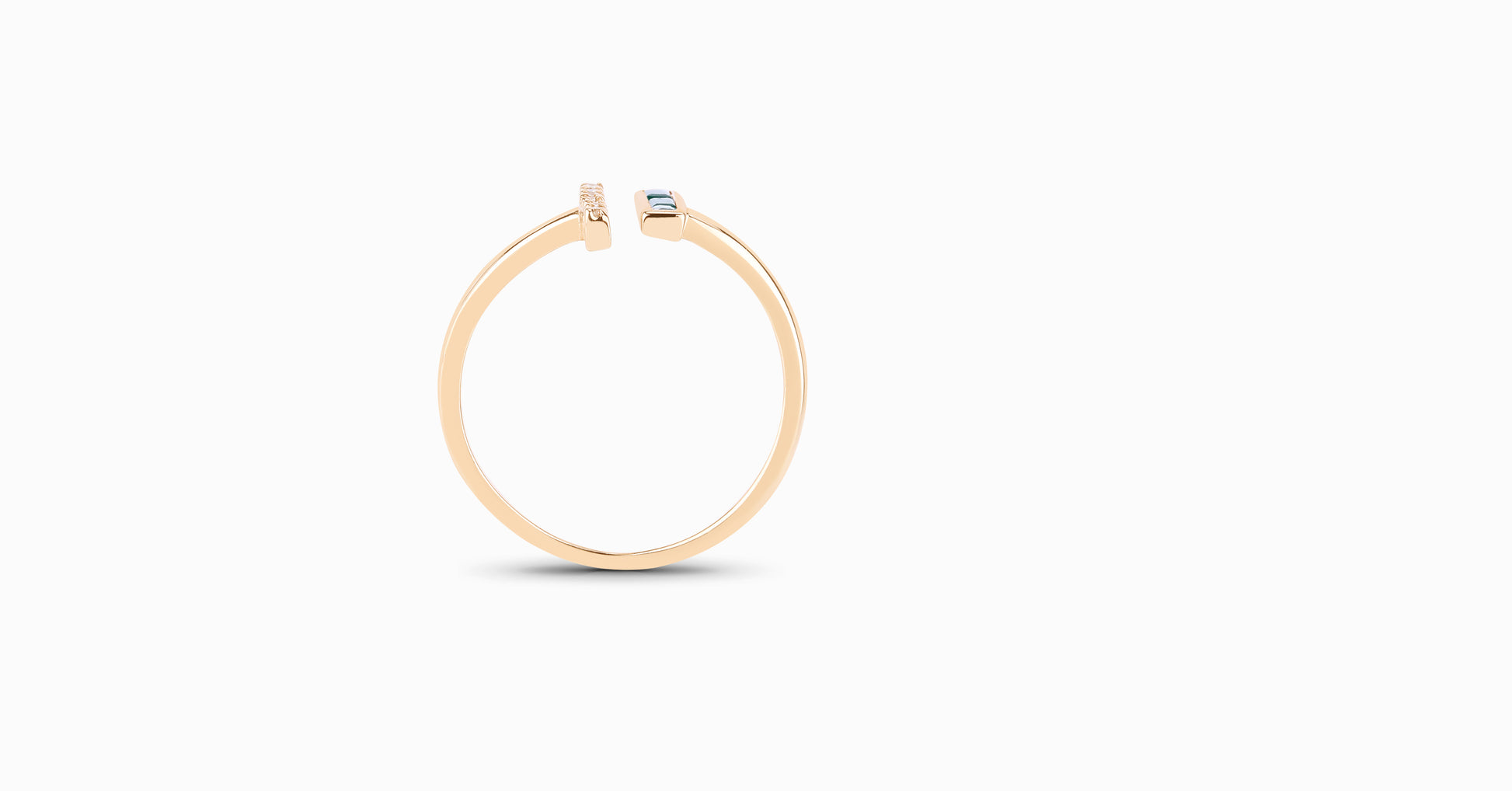14kt yellow gold ring with baguette-shaped emerald and pave diamonds