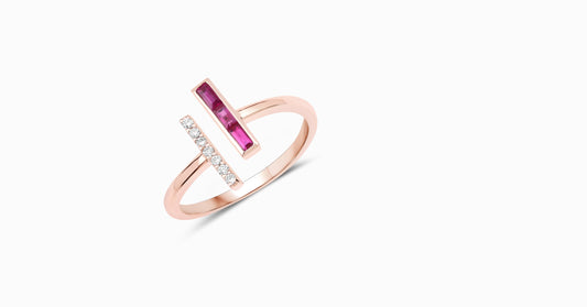 14kt rose gold ring with baguette-shaped ruby and pave diamonds