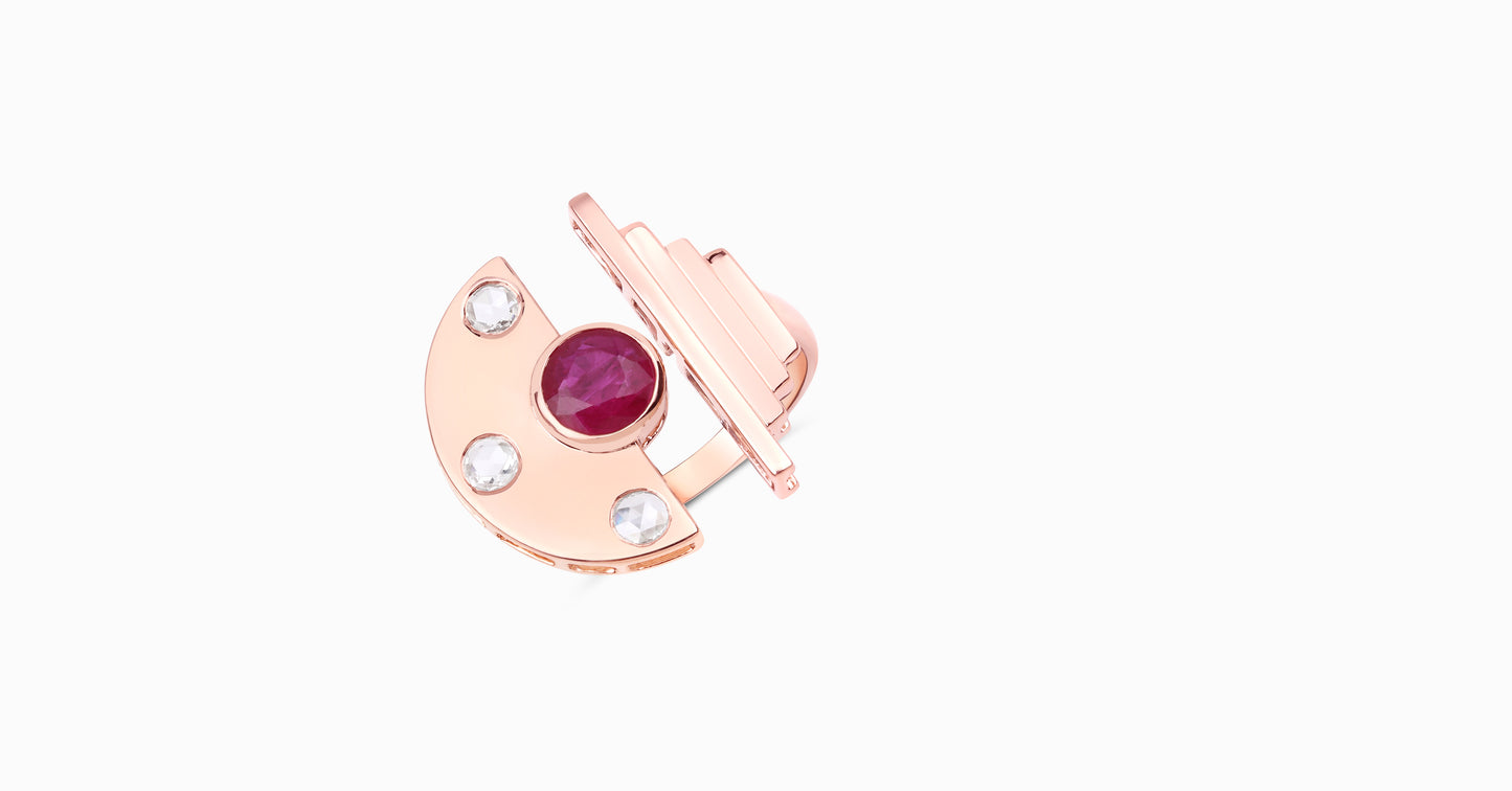 14kt rose gold ring with round-shaped ruby and bezel diamonds