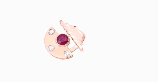 14kt rose gold ring with round-shaped ruby and bezel diamonds