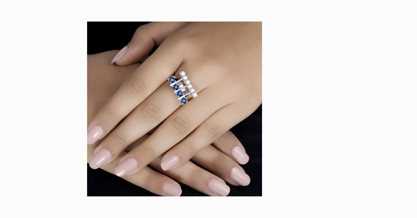 14kt white gold ring with round-shaped blue sapphire and diamonds