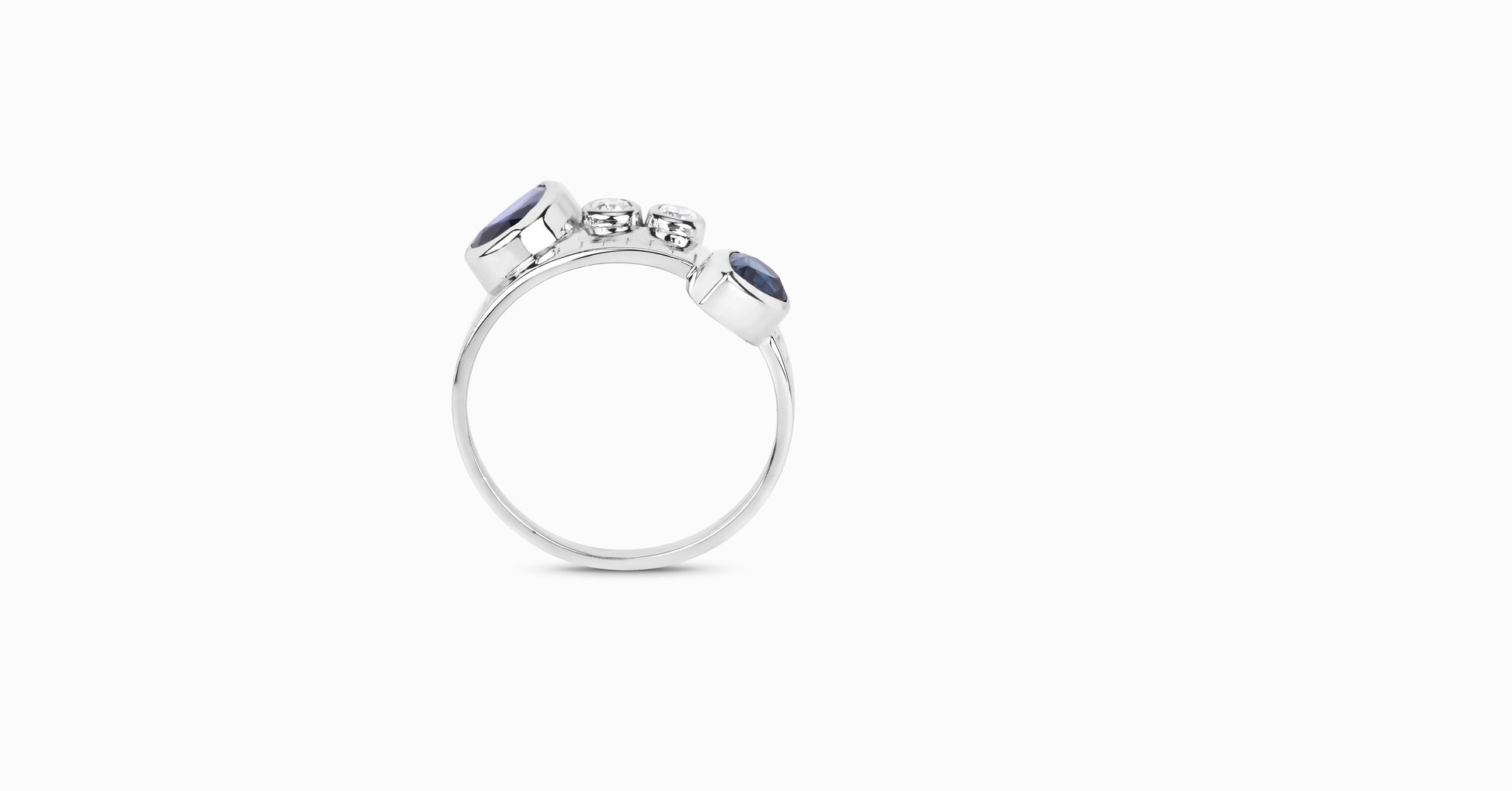 14kt white gold ring with pear-shaped blue sapphire and bezel diamonds