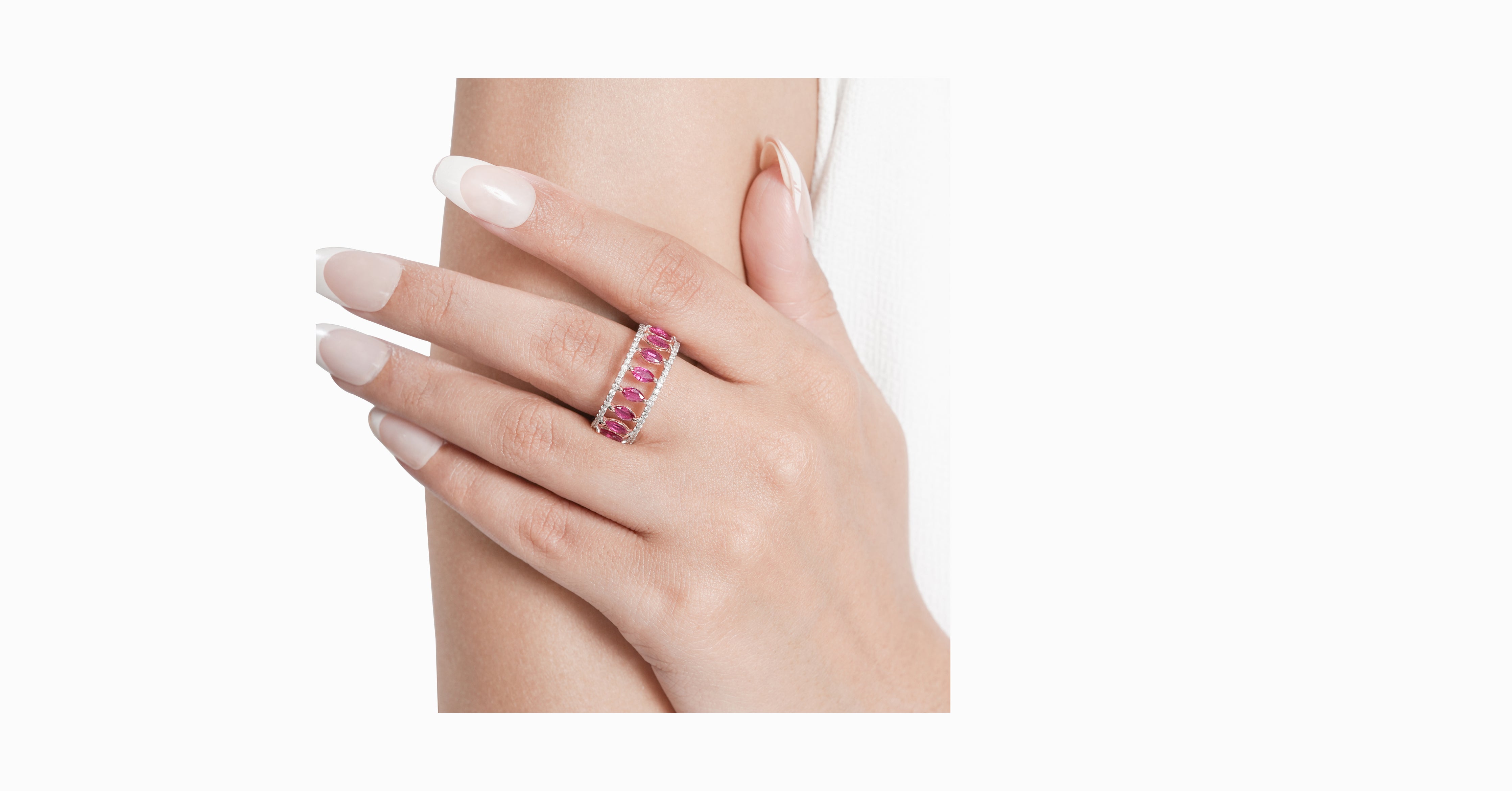 14kt rose gold ring with round-shaped diamonds and marquise-shaped ruby