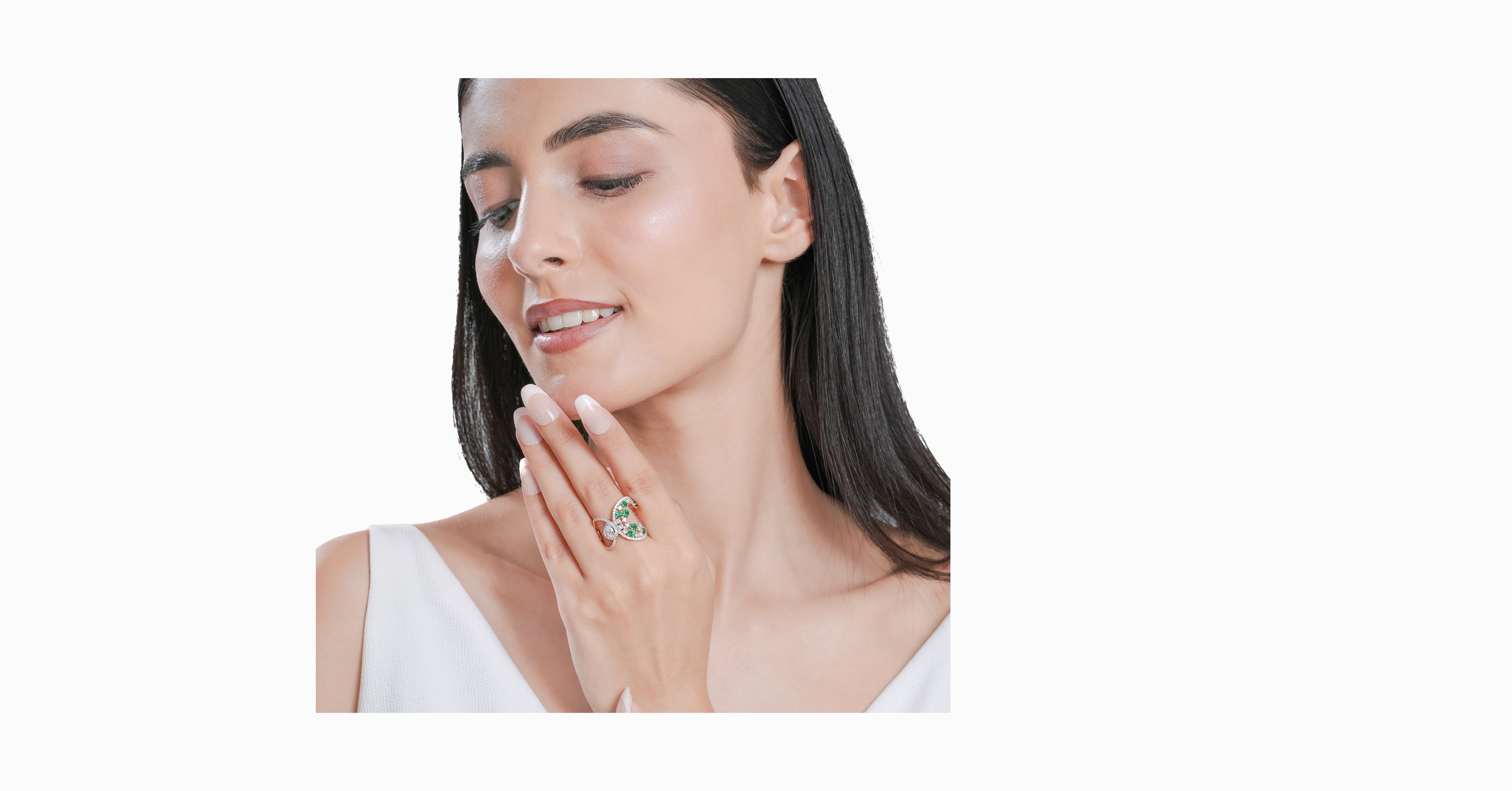 14kt yellow gold ring with round and pear-shaped diamonds and round-shaped emerald