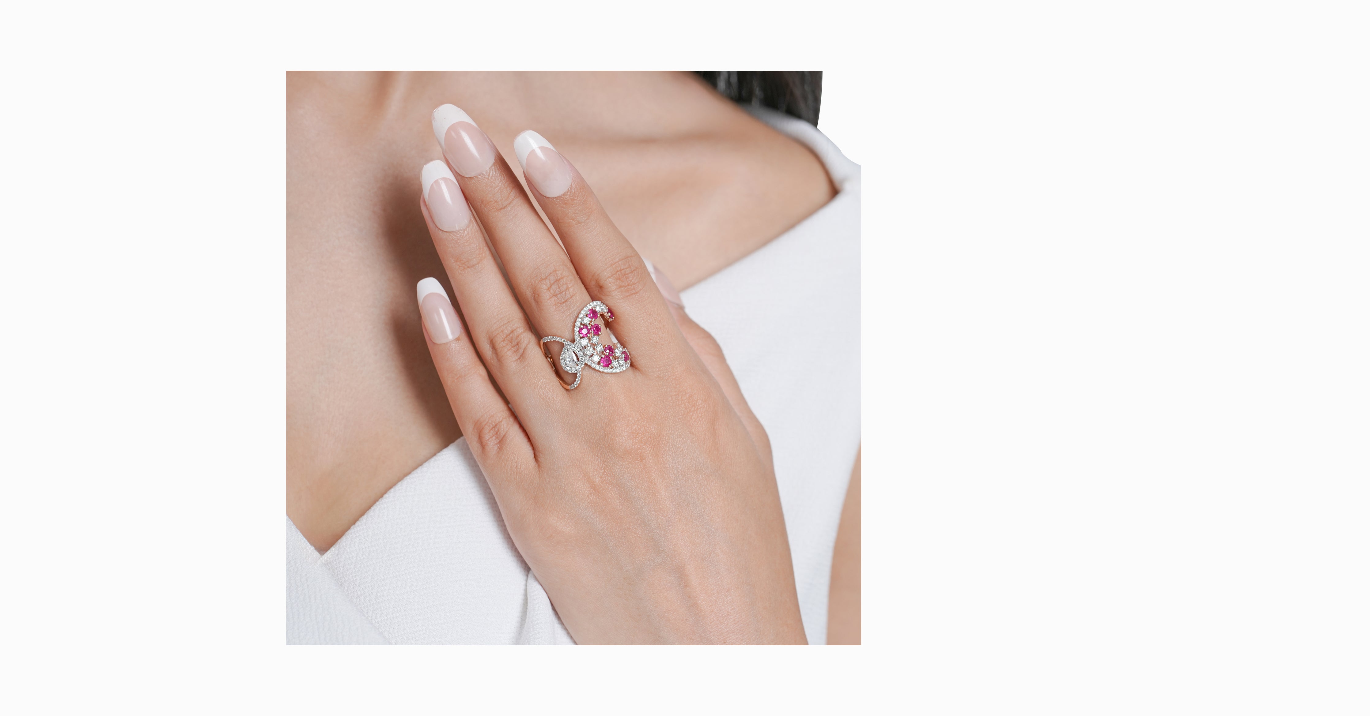 14kt rose gold ring with round and pear-shaped diamonds and round-shaped ruby