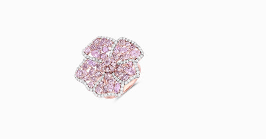 18kt rose gold ring with round-shaped white diamonds and mixed fancy-shaped natural pink diamonds