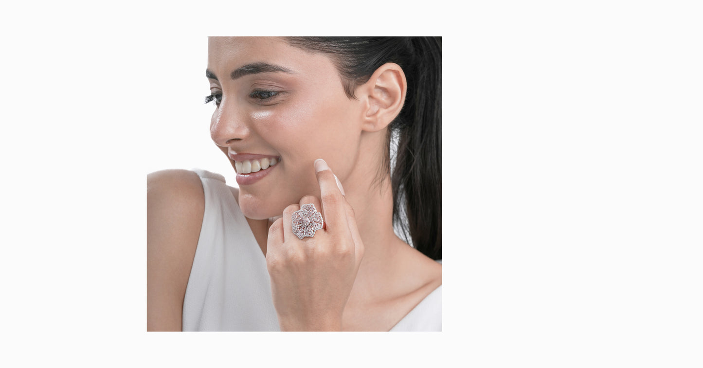 18kt rose gold ring with round-shaped white diamonds and mixed fancy-shaped natural pink diamonds