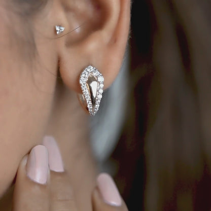 14kt yellow gold earrings with marquise-shaped emerald and pave diamonds
