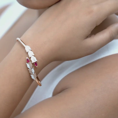 14kt rose gold bangle with marquise-shaped ruby and pave diamonds