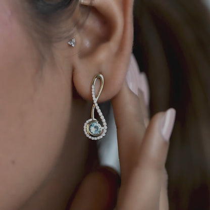 14kt yellow gold earrings with round-shaped aquamarine and pave diamonds